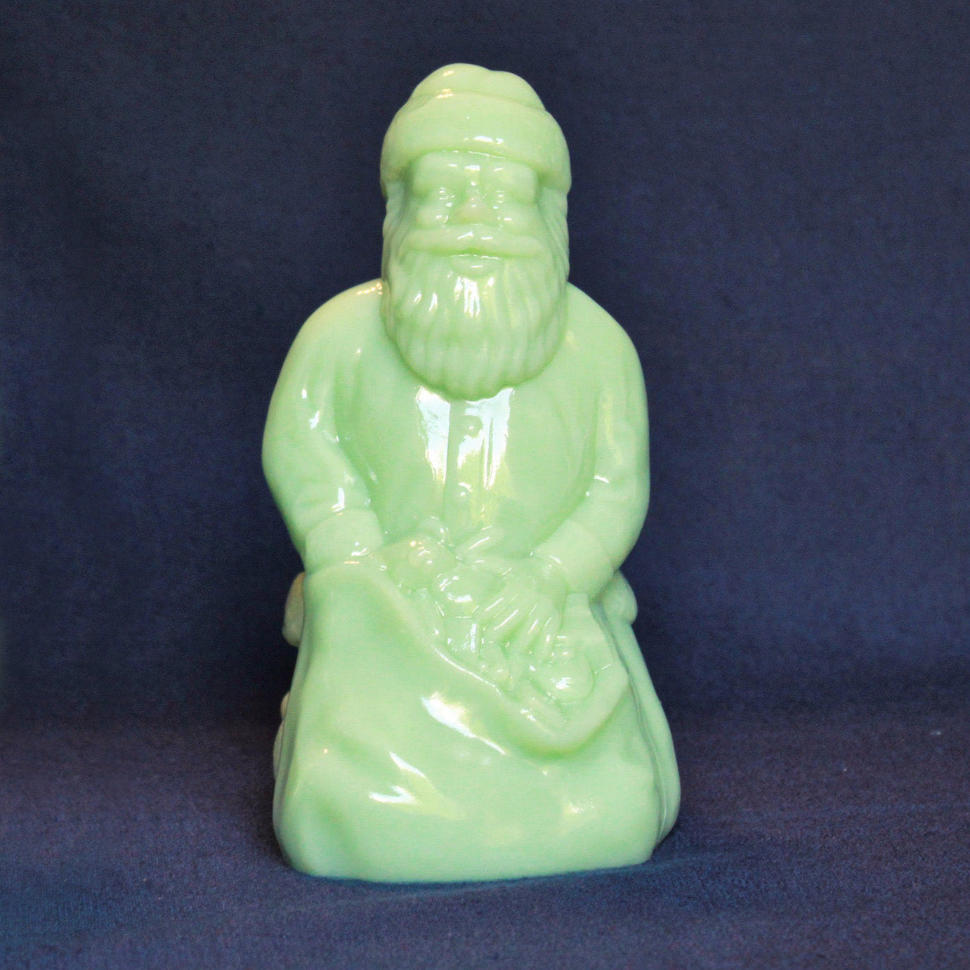 Mosser Kneeling Santa in Jadeite, 6-1/2" high, 4-7/8" long and 3-1/2" deep